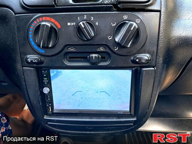 Красный Дэу Ланос, объемом двигателя 1.5 л и пробегом 170 тыс. км за 1600 $, фото 2 на Automoto.ua