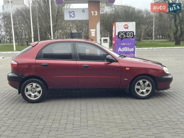 Красный Дэу Ланос, объемом двигателя 1.5 л и пробегом 194 тыс. км за 2300 $, фото 3 на Automoto.ua