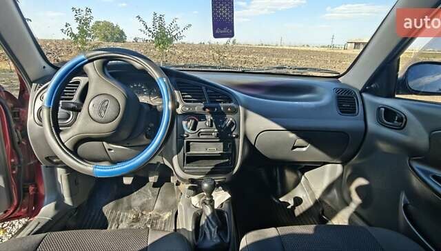 Красный Дэу Ланос, объемом двигателя 1.5 л и пробегом 183 тыс. км за 3200 $, фото 13 на Automoto.ua