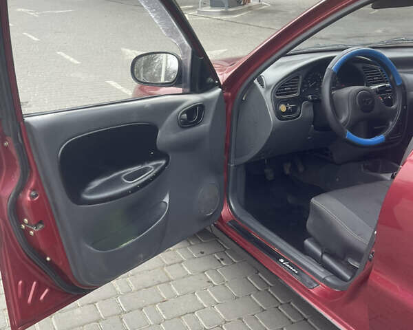Красный Дэу Ланос, объемом двигателя 1.5 л и пробегом 194 тыс. км за 2300 $, фото 8 на Automoto.ua