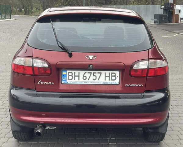Красный Дэу Ланос, объемом двигателя 1.5 л и пробегом 194 тыс. км за 2300 $, фото 5 на Automoto.ua