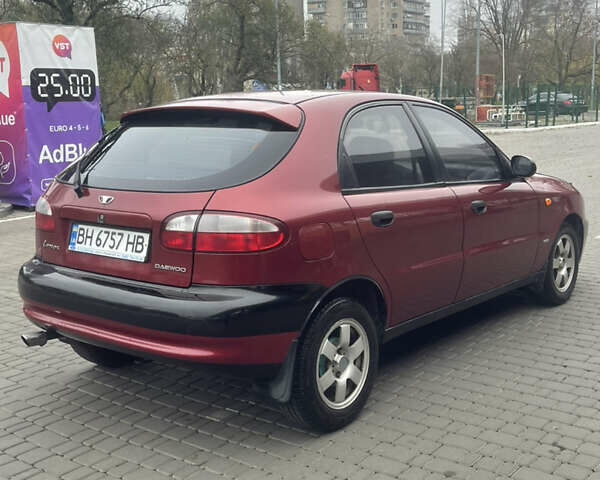 Красный Дэу Ланос, объемом двигателя 1.5 л и пробегом 194 тыс. км за 2300 $, фото 4 на Automoto.ua