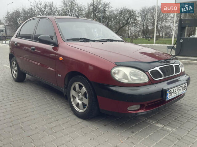 Красный Дэу Ланос, объемом двигателя 1.5 л и пробегом 194 тыс. км за 2300 $, фото 2 на Automoto.ua