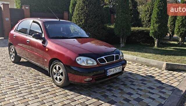 Красный Дэу Ланос, объемом двигателя 1.5 л и пробегом 183 тыс. км за 3200 $, фото 2 на Automoto.ua