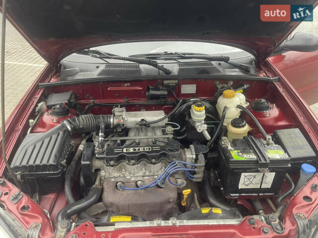 Красный Дэу Ланос, объемом двигателя 1.5 л и пробегом 194 тыс. км за 2300 $, фото 17 на Automoto.ua