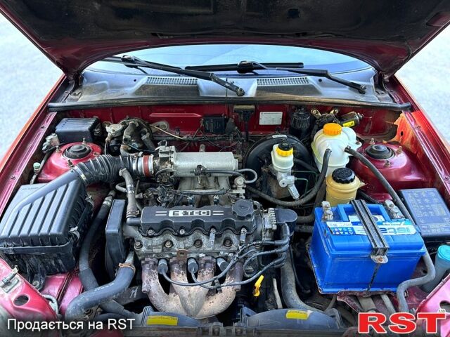 Красный Дэу Ланос, объемом двигателя 1.5 л и пробегом 290 тыс. км за 1950 $, фото 8 на Automoto.ua