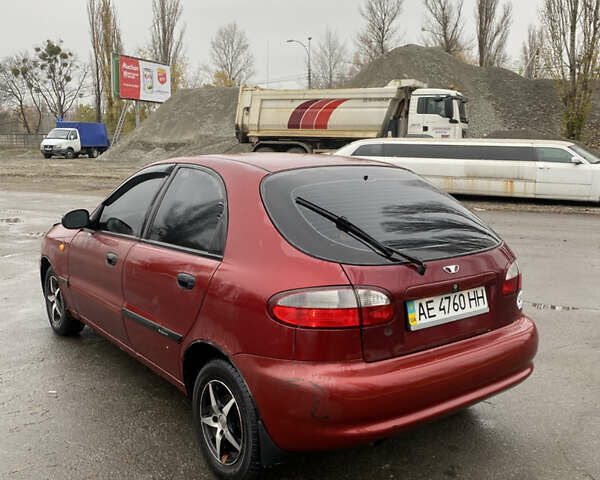 Красный Дэу Ланос, объемом двигателя 1.5 л и пробегом 350 тыс. км за 1399 $, фото 1 на Automoto.ua