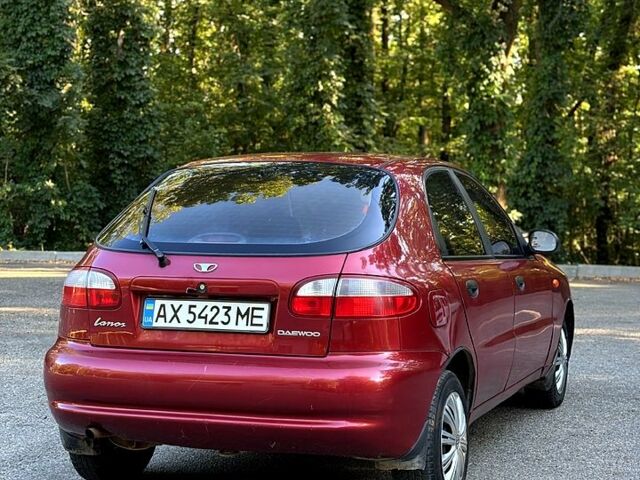 Красный Дэу Ланос, объемом двигателя 1.5 л и пробегом 290 тыс. км за 1950 $, фото 1 на Automoto.ua