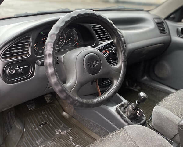 Красный Дэу Ланос, объемом двигателя 1.5 л и пробегом 350 тыс. км за 1399 $, фото 5 на Automoto.ua
