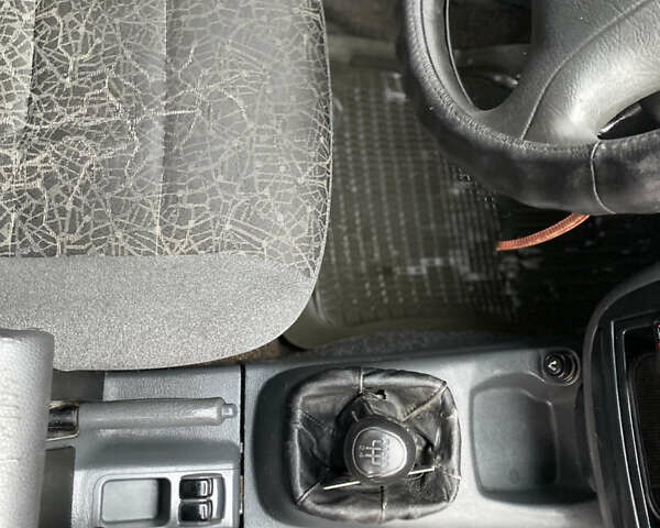 Красный Дэу Ланос, объемом двигателя 1.5 л и пробегом 350 тыс. км за 1399 $, фото 7 на Automoto.ua