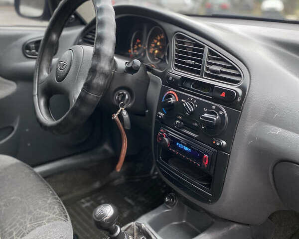 Красный Дэу Ланос, объемом двигателя 1.5 л и пробегом 350 тыс. км за 1399 $, фото 6 на Automoto.ua