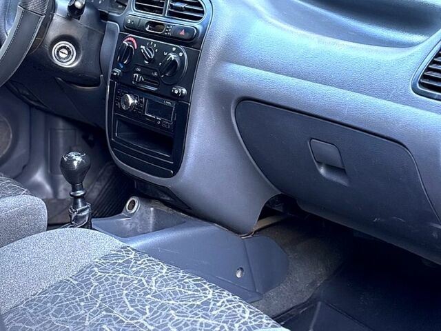 Красный Дэу Ланос, объемом двигателя 1.5 л и пробегом 290 тыс. км за 1950 $, фото 7 на Automoto.ua