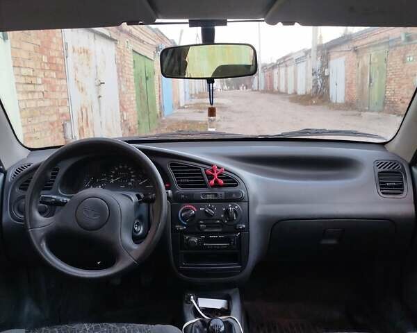Красный Дэу Ланос, объемом двигателя 1.5 л и пробегом 139 тыс. км за 2999 $, фото 6 на Automoto.ua