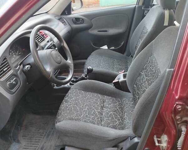 Красный Дэу Ланос, объемом двигателя 1.5 л и пробегом 139 тыс. км за 2999 $, фото 4 на Automoto.ua