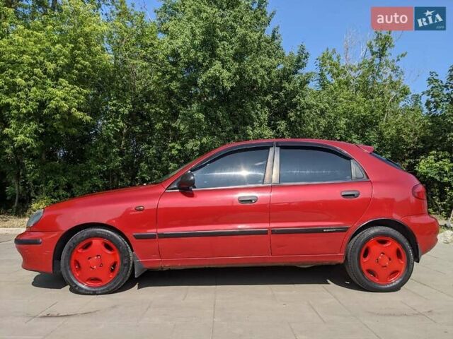 Красный Дэу Ланос, объемом двигателя 1.5 л и пробегом 139 тыс. км за 2900 $, фото 2 на Automoto.ua