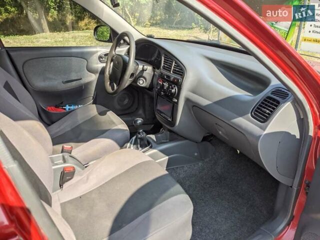 Красный Дэу Ланос, объемом двигателя 1.5 л и пробегом 139 тыс. км за 2900 $, фото 10 на Automoto.ua