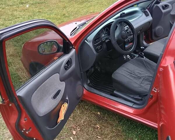 Дэу Ланос 2008 в Сумах на Automoto.ua Красный Дэу Ланос, объемом двигателя 1.5 л и пробегом 240 тыс. км за 3000 $, фото 9 на Automoto.ua