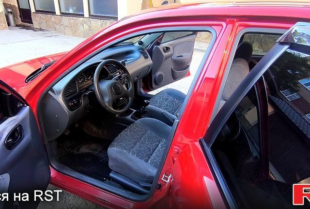 Красный Дэу Ланос, объемом двигателя 1.5 л и пробегом 195 тыс. км за 2850 $, фото 5 на Automoto.ua