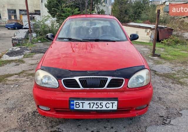 Красный Дэу Ланос, объемом двигателя 1.5 л и пробегом 170 тыс. км за 1399 $, фото 5 на Automoto.ua