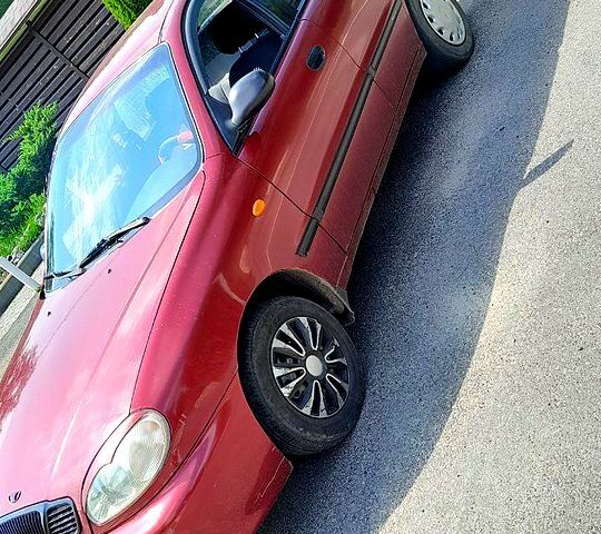 Красный Дэу Ланос, объемом двигателя 1.5 л и пробегом 250 тыс. км за 2300 $, фото 5 на Automoto.ua