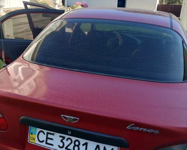 Красный Дэу Ланос, объемом двигателя 1.6 л и пробегом 355 тыс. км за 1600 $, фото 6 на Automoto.ua