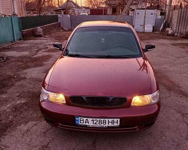 Червоний Деу Ланос, об'ємом двигуна 1.6 л та пробігом 180 тис. км за 1800 $, фото 2 на Automoto.ua