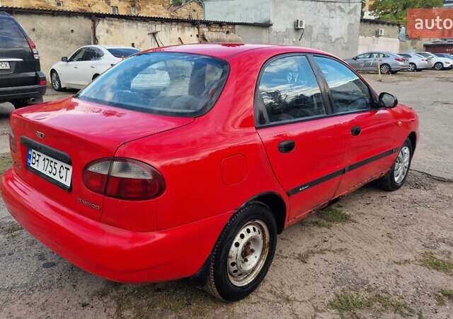Красный Дэу Ланос, объемом двигателя 1.5 л и пробегом 170 тыс. км за 1399 $, фото 6 на Automoto.ua