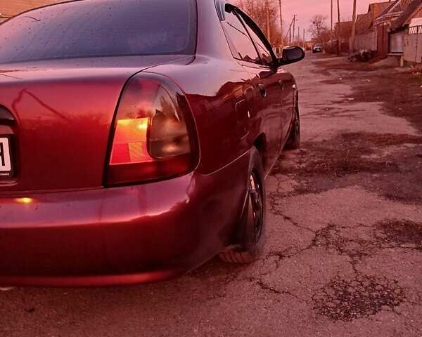 Червоний Деу Ланос, об'ємом двигуна 1.6 л та пробігом 180 тис. км за 1800 $, фото 4 на Automoto.ua