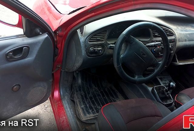 Червоний Деу Ланос, об'ємом двигуна 1.5 л та пробігом 195 тис. км за 1500 $, фото 5 на Automoto.ua