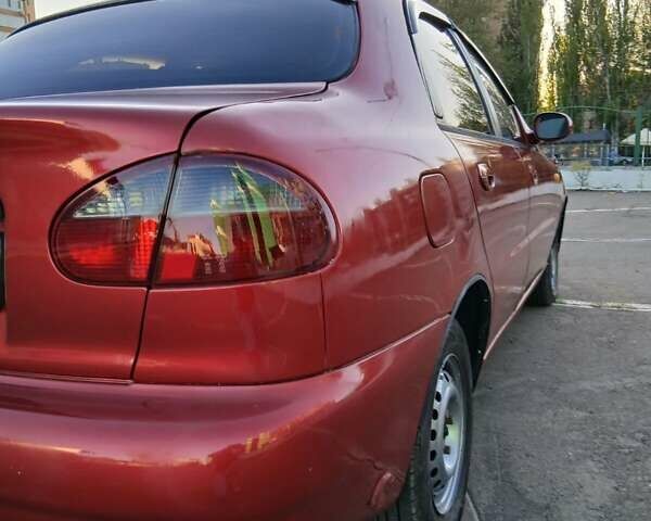 Красный Дэу Ланос, объемом двигателя 1.5 л и пробегом 335 тыс. км за 2200 $, фото 6 на Automoto.ua