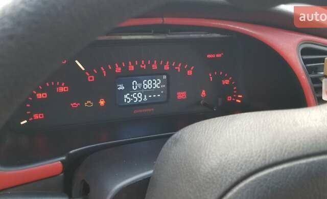 Красный Дэу Ланос, объемом двигателя 1.5 л и пробегом 320 тыс. км за 2100 $, фото 12 на Automoto.ua