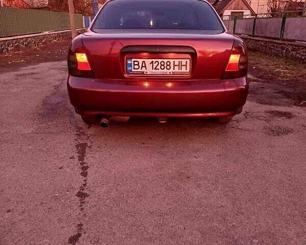 Червоний Деу Ланос, об'ємом двигуна 1.6 л та пробігом 180 тис. км за 1800 $, фото 3 на Automoto.ua