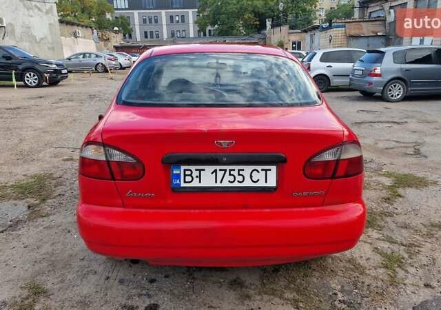 Красный Дэу Ланос, объемом двигателя 1.5 л и пробегом 170 тыс. км за 1399 $, фото 3 на Automoto.ua