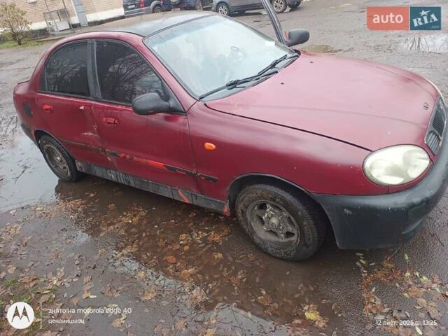 Красный Дэу Ланос, объемом двигателя 2 л и пробегом 123 тыс. км за 1185 $, фото 1 на Automoto.ua