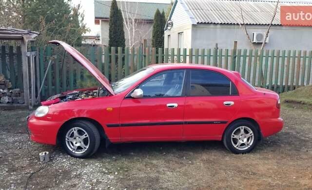 Красный Дэу Ланос, объемом двигателя 1.5 л и пробегом 320 тыс. км за 2100 $, фото 4 на Automoto.ua