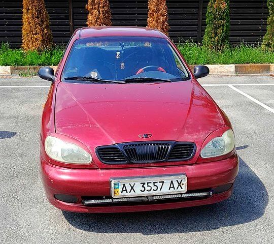 Красный Дэу Ланос, объемом двигателя 1.5 л и пробегом 250 тыс. км за 2300 $, фото 2 на Automoto.ua