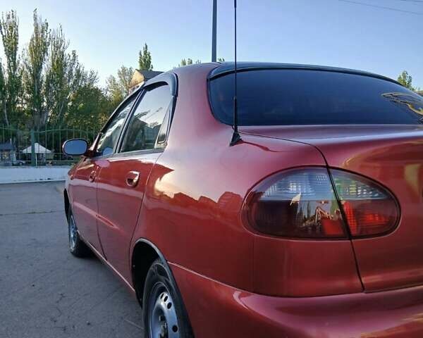 Красный Дэу Ланос, объемом двигателя 1.5 л и пробегом 335 тыс. км за 2200 $, фото 7 на Automoto.ua