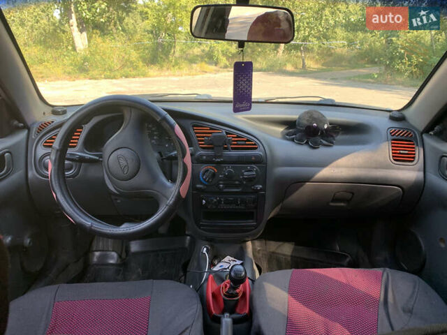 Красный Дэу Ланос, объемом двигателя 1.5 л и пробегом 174 тыс. км за 1500 $, фото 8 на Automoto.ua