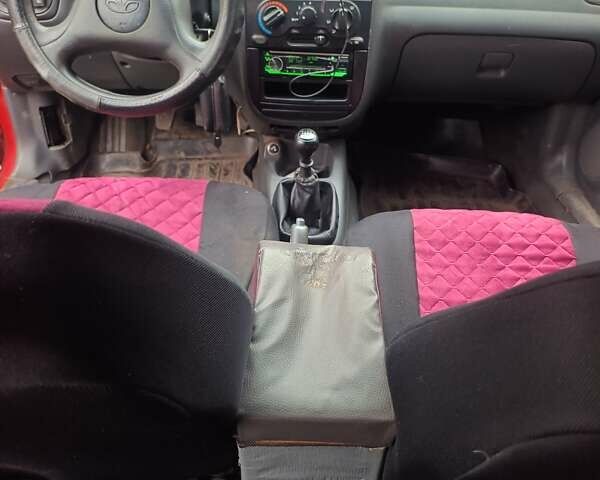 Красный Дэу Ланос, объемом двигателя 2 л и пробегом 123 тыс. км за 1185 $, фото 2 на Automoto.ua