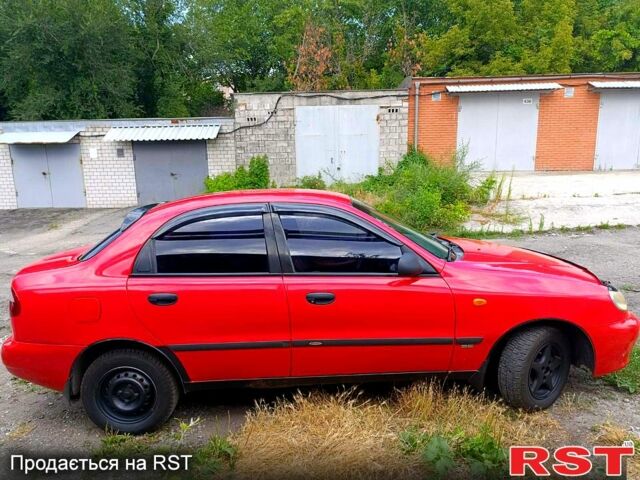 Красный Дэу Ланос, объемом двигателя 1.5 л и пробегом 172 тыс. км за 2000 $, фото 2 на Automoto.ua