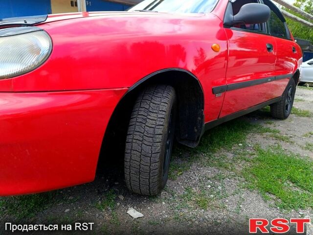 Красный Дэу Ланос, объемом двигателя 1.5 л и пробегом 172 тыс. км за 2000 $, фото 3 на Automoto.ua