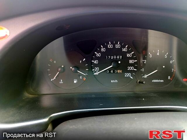 Красный Дэу Ланос, объемом двигателя 1.5 л и пробегом 172 тыс. км за 2000 $, фото 4 на Automoto.ua