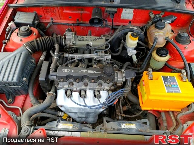 Красный Дэу Ланос, объемом двигателя 1.5 л и пробегом 172 тыс. км за 2000 $, фото 6 на Automoto.ua