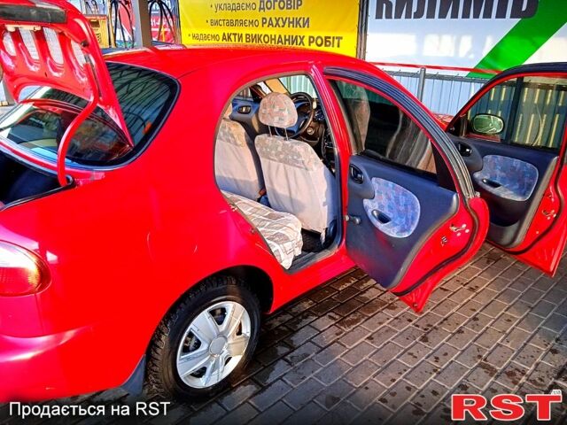 Червоний Деу Ланос, об'ємом двигуна 1.6 л та пробігом 247 тис. км за 2080 $, фото 3 на Automoto.ua