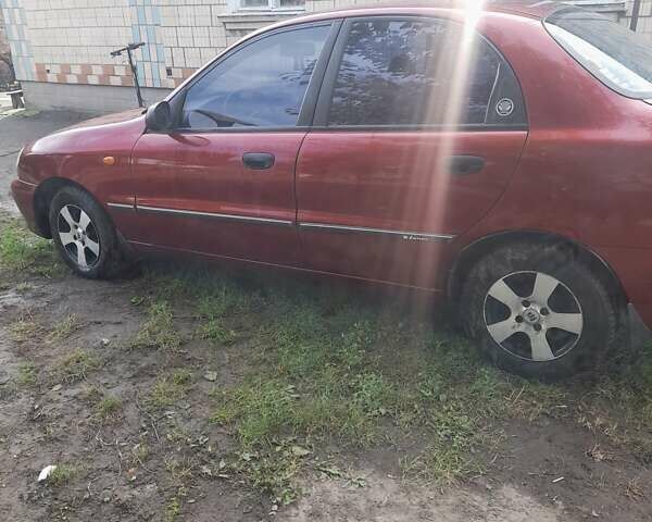 Красный Дэу Ланос, объемом двигателя 1.3 л и пробегом 270 тыс. км за 1600 $, фото 4 на Automoto.ua