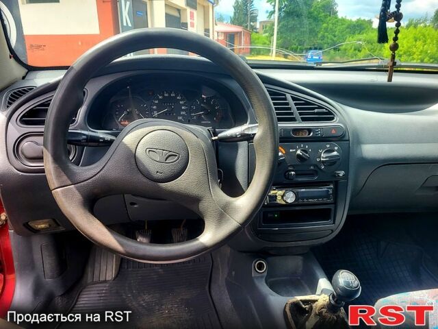 Красный Дэу Ланос, объемом двигателя 1.5 л и пробегом 520 тыс. км за 1450 $, фото 8 на Automoto.ua