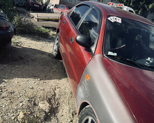 Деу Ланос 2002 у Старокостянтинів на Automoto.ua Червоний Деу Ланос, об'ємом двигуна 1.6 л та пробігом 250 тис. км за 1300 $, фото 5 на Automoto.ua