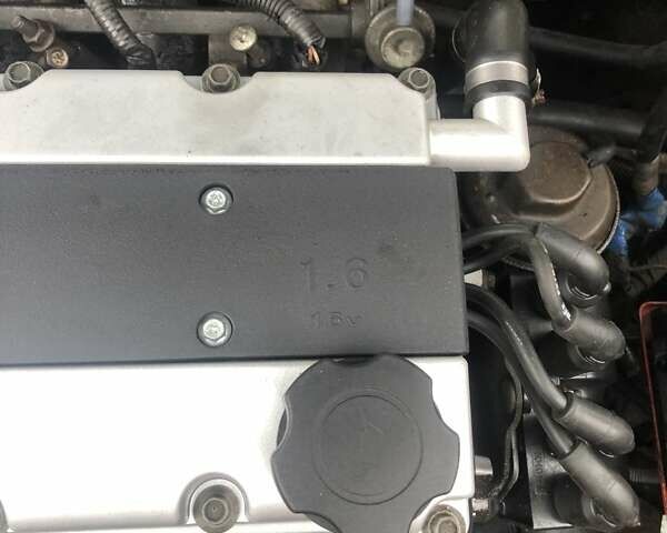 Красный Дэу Ланос, объемом двигателя 1.6 л и пробегом 251 тыс. км за 2300 $, фото 3 на Automoto.ua