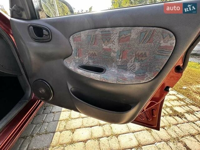 Красный Дэу Ланос, объемом двигателя 1.5 л и пробегом 326 тыс. км за 3100 $, фото 21 на Automoto.ua