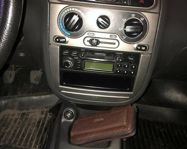 Красный Дэу Ланос, объемом двигателя 1.6 л и пробегом 251 тыс. км за 2300 $, фото 4 на Automoto.ua